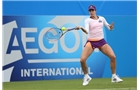 EASTBOURNE, ENGLAND - JUNE 14: Christina Mchale of USA plays a forehand against Samantha Murray of Great Britain during their Women's Singles first round qualifying match on day one of the Aegon International at Devonshire Park on June 14, 2014 in Eastbourne, England.  (Photo by Steve Bardens/Getty Images)